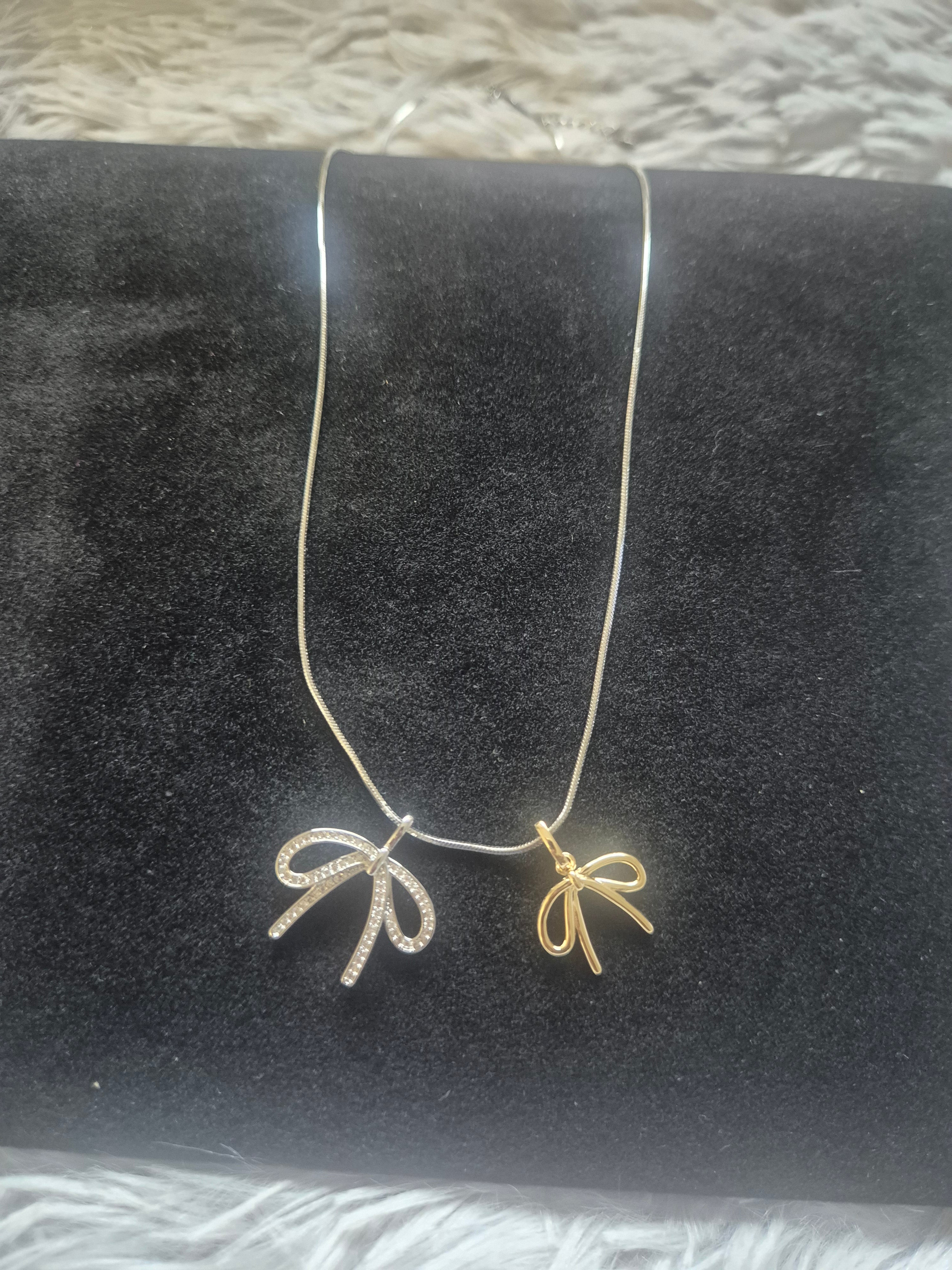 Double bow pendant necklace