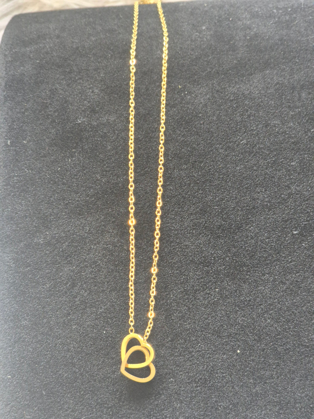 Double heart bond necklace